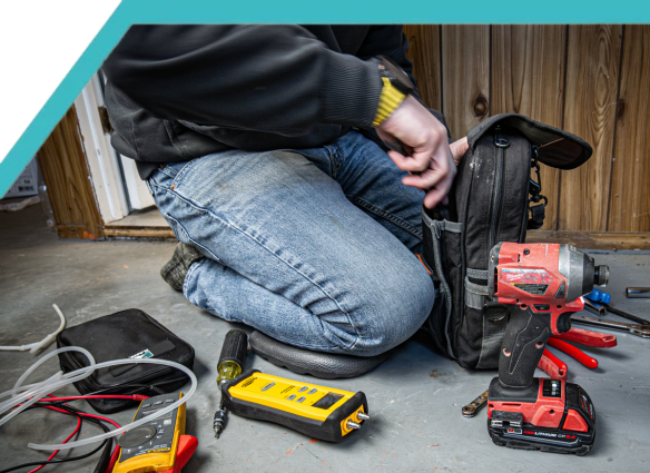Wamboldt HVAC technician with tools
